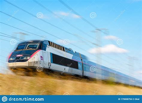 A Tgv High Speed Train In The French Countryside With Motion Blur