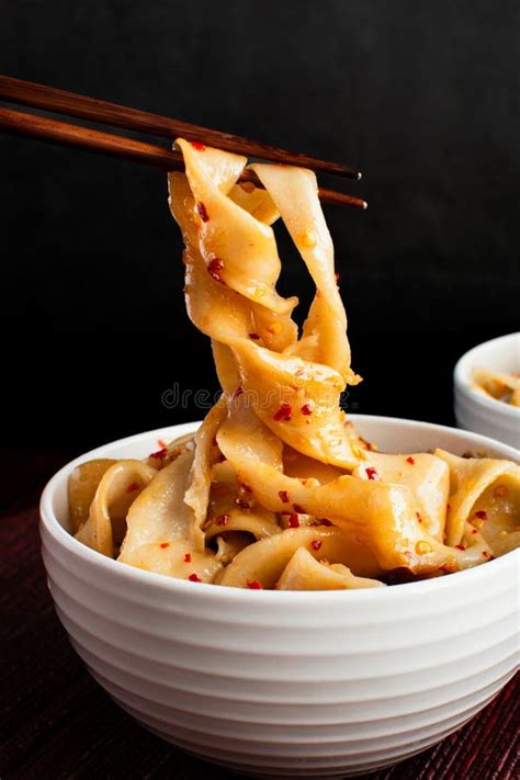 Chopsticks Holding Biang Biang Noodles Stock Image Image Of Food Bowls 305706371
