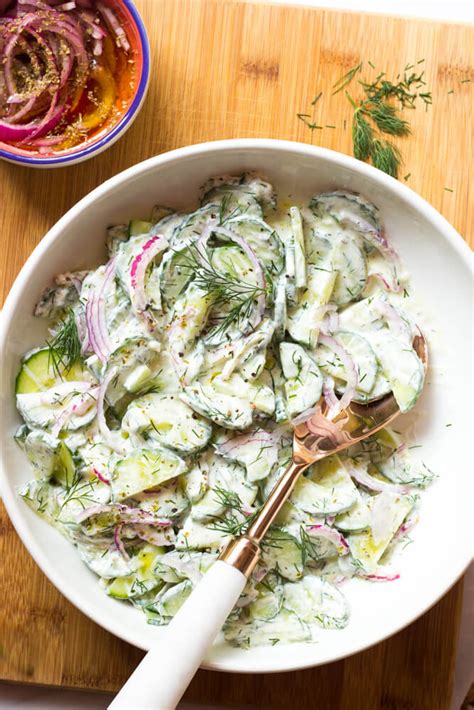 Transfer chilled cucumber slices to a colander and drain for approximately 30 minutes. Creamy Greek Cucumber Salad - Little Broken