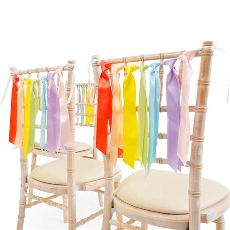 The fluid ribbon chair challenges the idea of sitting still. Pastel Rainbow Ribbon Chair Backs By Bubblegum Balloons ...