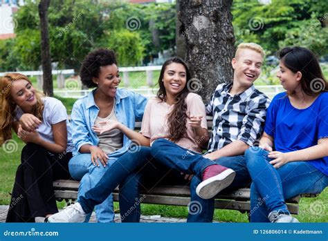 Group Of Chilling Multi Ethnic Young Adult People Stock Photo Image