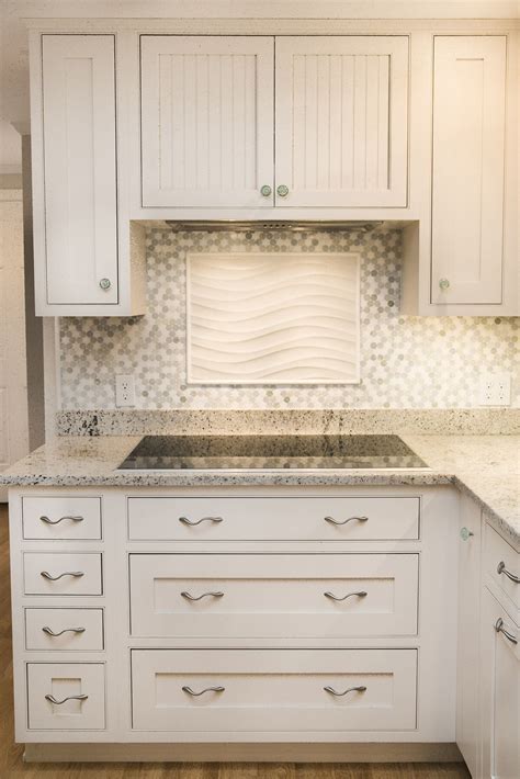 White Inset Shaker With Bead Detail Hidden Hood Over The Glass Top