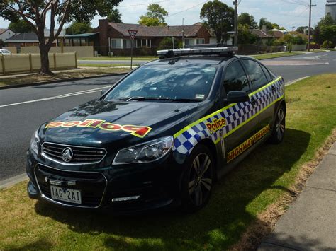 A Police Car Is Parked On The Side Of The Road