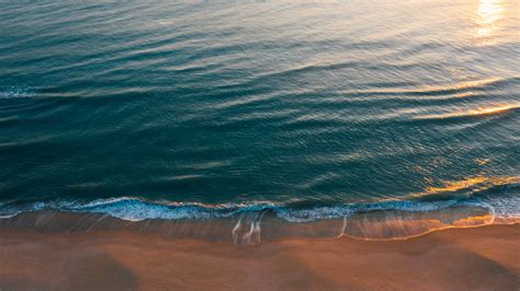 Soft Wave Of Blue Ocean On Sandy Beach · Free Stock Photo
