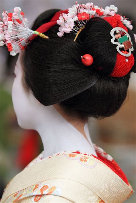 Two hands dressing a geisha's hair during an important street event in gion(geisha's ward in kyoto,japan).the light play is something very. Kanzashi --Ume flowers-- | Geisha, Kanzashi, Japanese ...