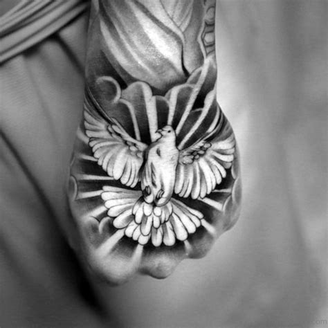 Untangled dove and a couple of rings tattoo highlights the fact that freedom exists even in marriage. 43 Fancy Birds Tattoos On Hand