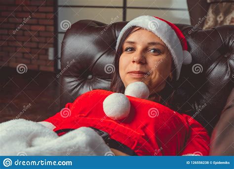 Cute Girl Dressed As Santa Claus Happy New Year And Merry Christmas