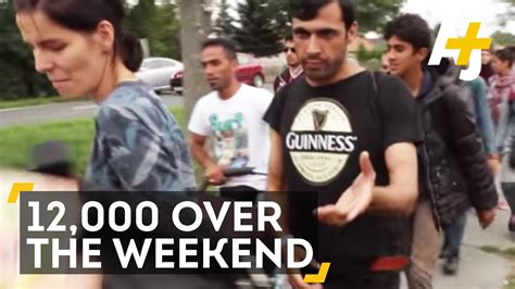 Thousands Of Refugees Traveling From Hungary To Austria Youtube