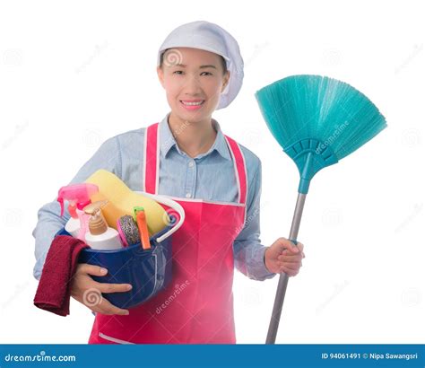 Happy Woman Holding A Bucket Full Of Cleaning Supplies Isolated Stock