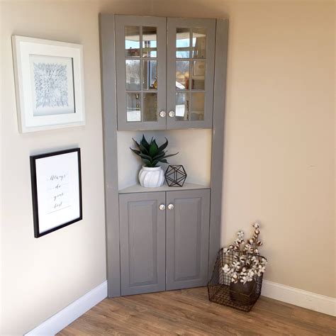 Stylish And Space Saving The Tall Corner Cabinet With Glass Doors