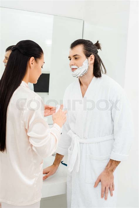 Woman Applying Shaving Foam On Husband Face Stock Image Colourbox