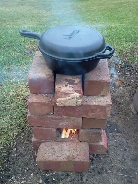 A rocket stove is a useful survival tool because it produces a very hot flame and needs very little fuel. Red brick rocket stove | Backyard bbq pit, Rocket stoves ...
