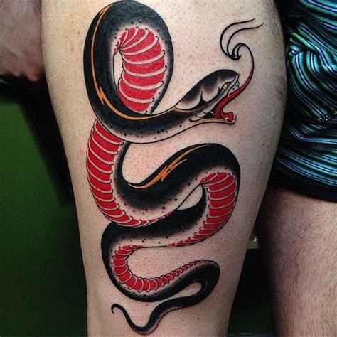 All of our artists are knowledgeable about tattoos and how they work with the body, so you're left with a tattoo that not only looks good when you walk out the door. snake traditional | Snake tattoo, Traditional snake tattoo, Tattoos