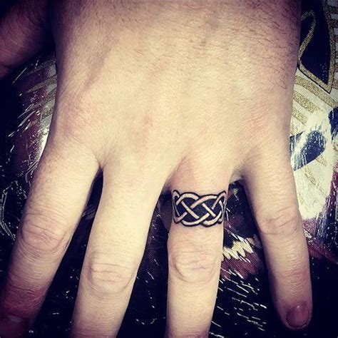 Wedding ring tattoos mean love and. Ring Finger Tattoos Celtic in 2020 | Tattoo wedding rings ...