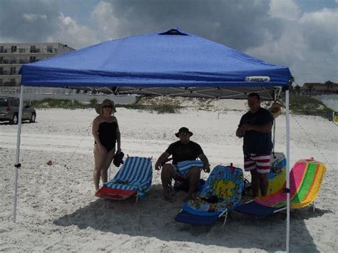 Setting Up The Tent On The Beach In Front Of The Motel Picture Of