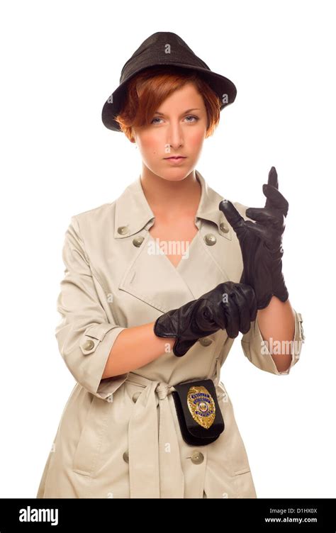 Attractive Female Detective With Badge And Leather Gloves In Trench