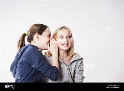 Two Teen Girls Whispering Hi Res Stock Photography And Images Alamy