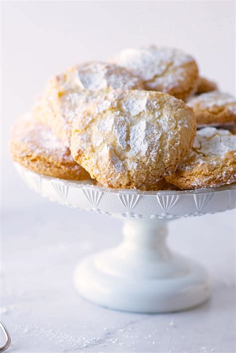 Remove from the oven and take the edges of the paper to transfer the whole thing onto a cooking rack. Almond Cloud Cookies Recipe | King Arthur Flour