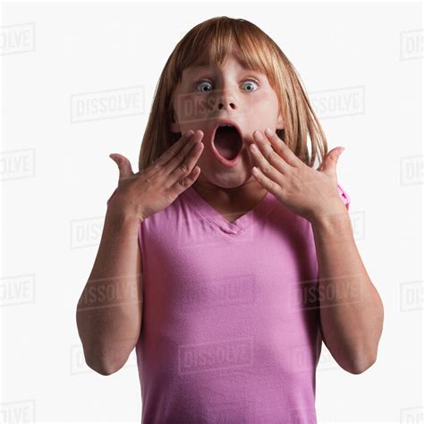 Portrait Of Surprised Young Girl Stock Photo Dissolve