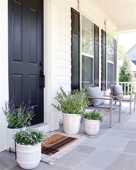 Matte Black Front Door With Flagstone Porch Soul And Lane