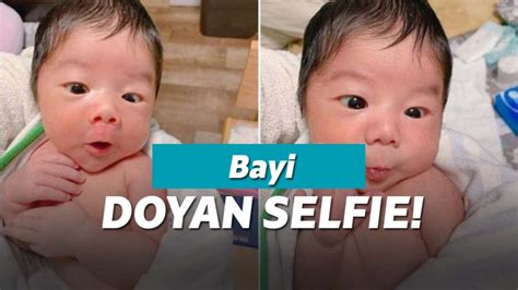 Viral Bayi Lucu Pintar Pose Pas Lagi Difoto