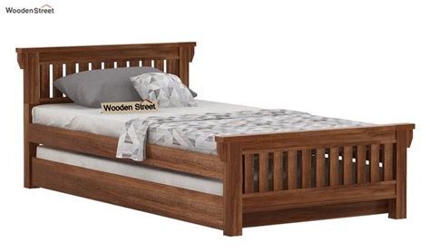 A wooden bed where you can unwind after a long day is a bliss. Buy Kendra Trundle Bed (Teak Finish) Online in India ...