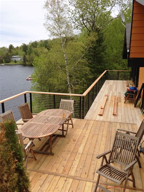 Lake House In Montreal Canada Elevated Deck Update With Cable Railing