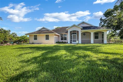 Loxahatchee, fl homes for sale & real estate. Sprawling Loxahatchee, FL home offering indoor & outdoo