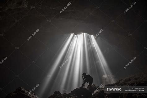 Silhouette Of A Man Taking A Photograph Jomblang Cave Central Java