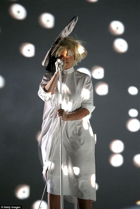 Sia Finally Reveals Her Face On Colorado Stage As She Gets Caught In A