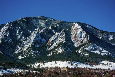 The Flatirons Mountains In Boulder Colorado On A Snowy Winter Day