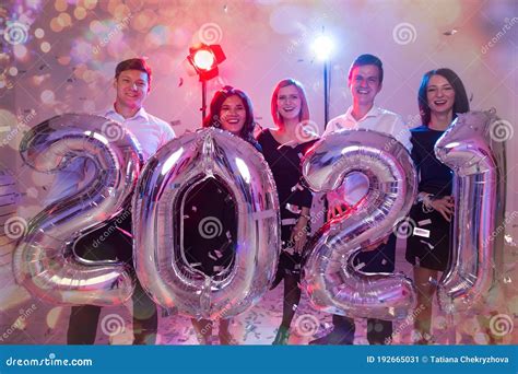 Party People And New Year Holidays Concept Women And Men Celebrating