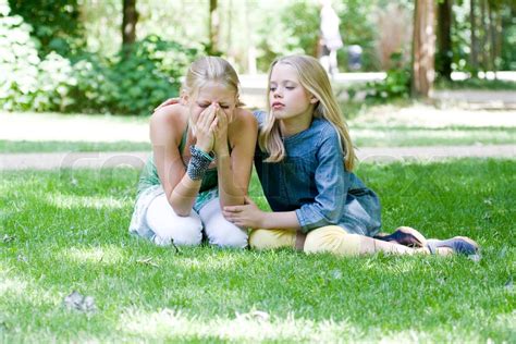 A Crying Teenage Girl Being Comforted By A Friend Stock Image Colourbox