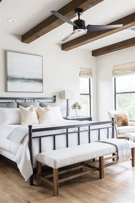 One might think exposed beam ceiling lighting ideas are limited. Wood beam detail + exposed beams + bench at end of bed ...