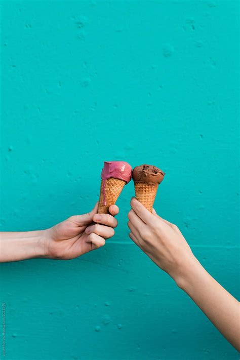 cheers pink and brown ice cream cones by stocksy contributor jesse morrow eating ice cream