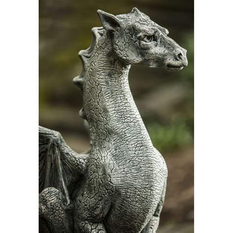 Outdoor statuary large metal dragon statue crafted from galvanized metal painted with metallic black finish garden decor. Cast Stone Large Dragon Outdoor Statue | Kinsey Garden Decor