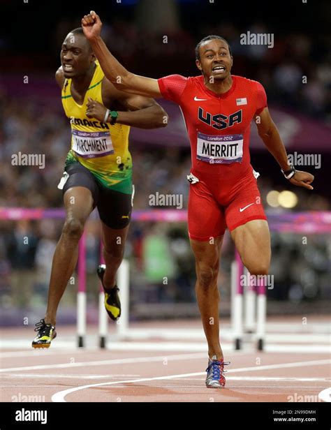United States Aries Merritt Crosses The Finish Line Ahead Of Jamaica S Hansle Parchment To Win