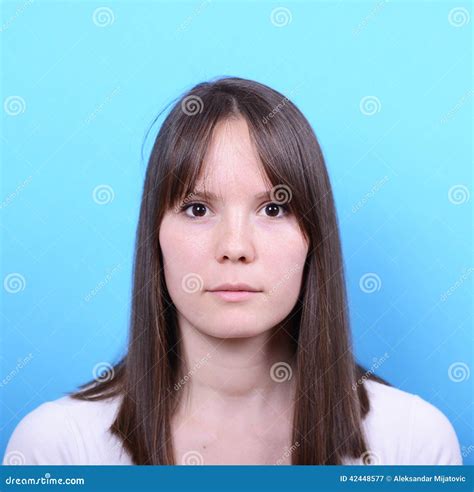 Portrait Of Beautiful Woman Against Blue Background Stock Image Image