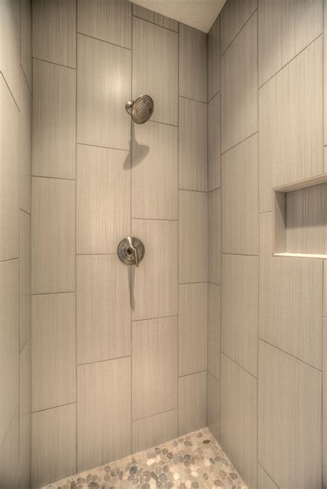 (in a bathroom, this is often the center of the vanity wall above the sink.) measure and use a level to establish the horizontal and vertical center points on the walls. Master Shower Designs | Vertical shower tile, Shower tile ...