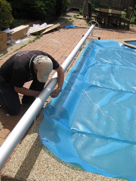 Related posts of diy pool cover weights references. Attach pool cover to reel | Pool cover, Hidden pool, Pool ...