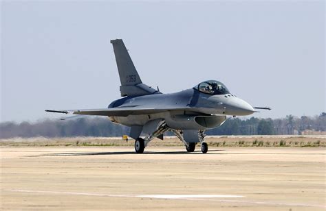 Fighter Jet Free Stock Photo An F 16 Fighting Falcon On A Runway