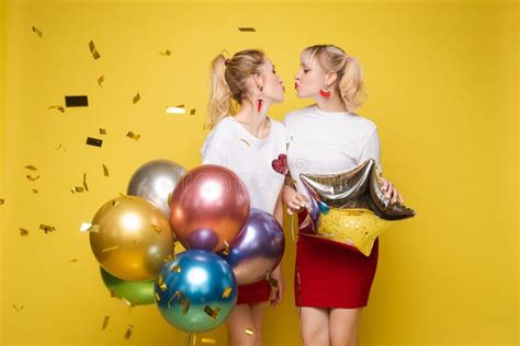 Two Happy Beautiful Woman Friend Celebrating Posing Surrounded By