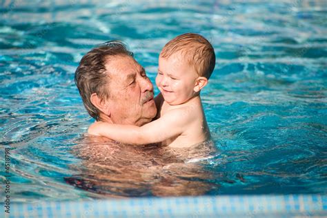Grandfather Swimming With Grandson Stock Foto Adobe Stock