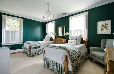 A combination of wallpaper, paint, and bedding with touches of the hue come together in this stylish space. Decorating Ideas for Dark Colored Bedroom Walls