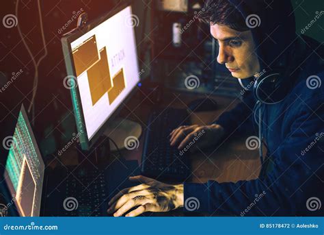 Hacker In The Dark Breaks The Access To Steal Information Stock Photo