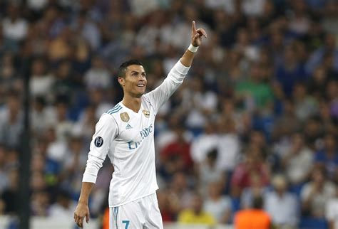 Real madrid's portuguese forward cristiano ronaldo (r) celebrates with real madrid's colombian midfielder james rodriguez (c) and real madrid's midfielder marco asensio after scoring during the spanish league football match real madrid cf vs sevilla fc at the santiago bernabeu stadium in. CHAMPIONS LEAGUE: Ronaldo scores twice as Madrid open with ...