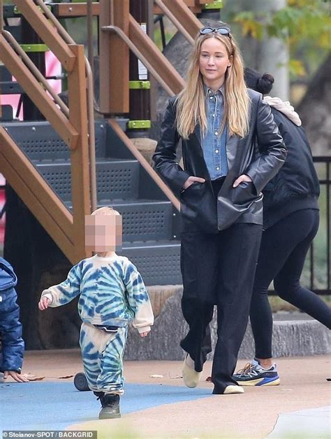 Jennifer Lawrence Embraces Her Son Cy One During A Post Christmas