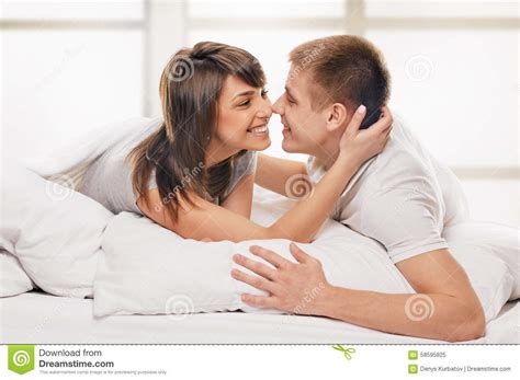 Couple Lying In Bed Embrace Stock Image Image Of Lying White 58595825
