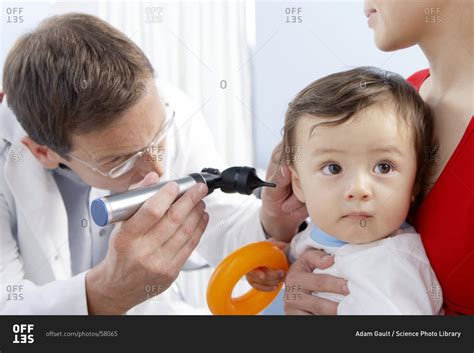 Ear Examination Otoscope Being Used By A General Practice Doctor To