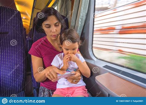 Mother And Her Daughter Enjoy The Train Trip Stock Image Image Of